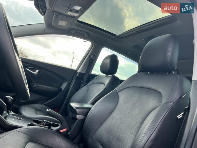 Сірий Хендай іх35, об'ємом двигуна 2 л та пробігом 178 тис. км за 11999 $, фото 7 на Automoto.ua