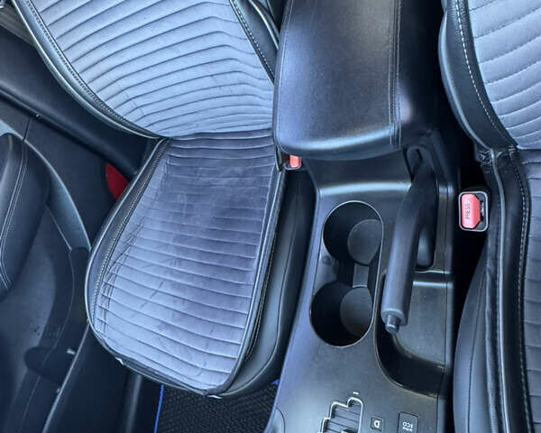 Сірий Хендай іх35, об'ємом двигуна 2 л та пробігом 121 тис. км за 13500 $, фото 5 на Automoto.ua