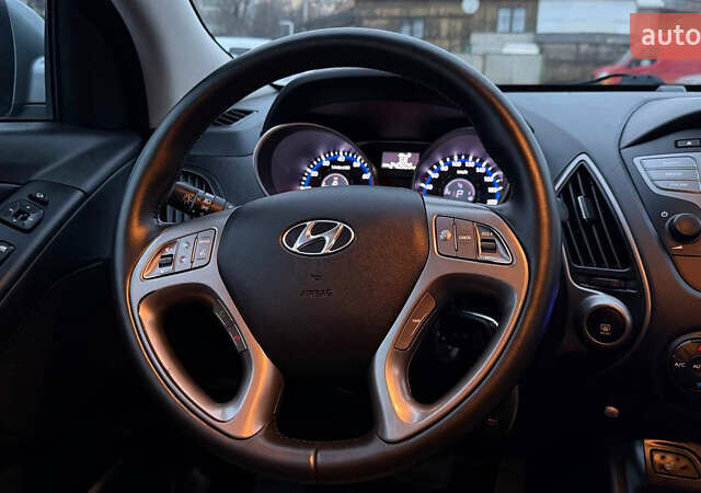 Сірий Хендай іх35, об'ємом двигуна 2 л та пробігом 240 тис. км за 13000 $, фото 15 на Automoto.ua