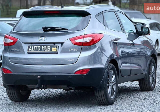 Сірий Хендай іх35, об'ємом двигуна 2 л та пробігом 240 тис. км за 13000 $, фото 11 на Automoto.ua