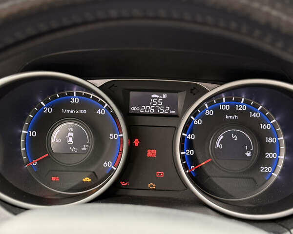 Сірий Хендай іх35, об'ємом двигуна 2 л та пробігом 205 тис. км за 12499 $, фото 9 на Automoto.ua