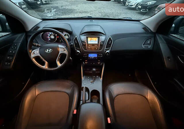 Сірий Хендай іх35, об'ємом двигуна 2 л та пробігом 240 тис. км за 13000 $, фото 19 на Automoto.ua