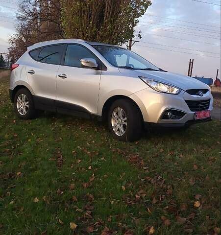 Сірий Хендай іх35, об'ємом двигуна 2 л та пробігом 208 тис. км за 14750 $, фото 8 на Automoto.ua