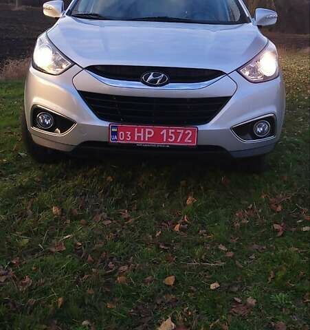 Сірий Хендай іх35, об'ємом двигуна 2 л та пробігом 208 тис. км за 14750 $, фото 7 на Automoto.ua