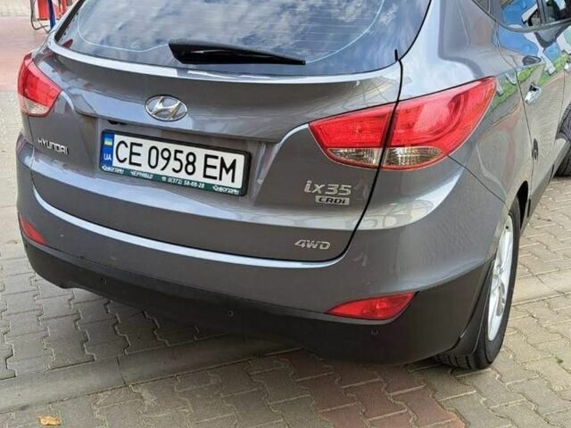 Серый Хендай их35, объемом двигателя 2 л и пробегом 198 тыс. км за 15000 $, фото 3 на Automoto.ua