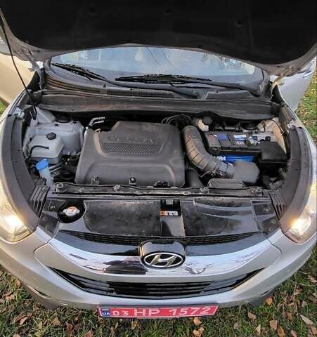 Сірий Хендай іх35, об'ємом двигуна 2 л та пробігом 208 тис. км за 14750 $, фото 13 на Automoto.ua