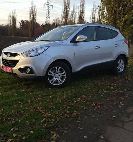 Сірий Хендай іх35, об'ємом двигуна 2 л та пробігом 208 тис. км за 14750 $, фото 9 на Automoto.ua