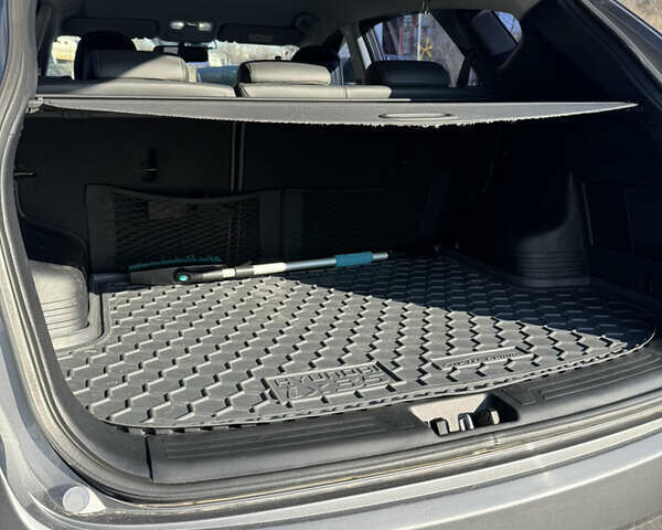 Сірий Хендай іх35, об'ємом двигуна 2 л та пробігом 121 тис. км за 13500 $, фото 23 на Automoto.ua