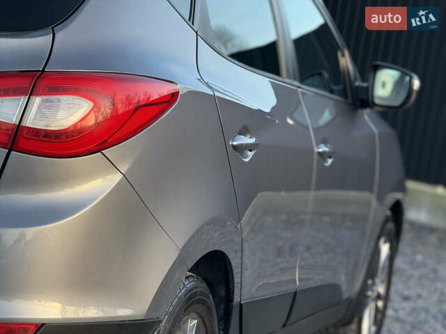 Сірий Хендай іх35, об'ємом двигуна 2 л та пробігом 230 тис. км за 14450 $, фото 23 на Automoto.ua