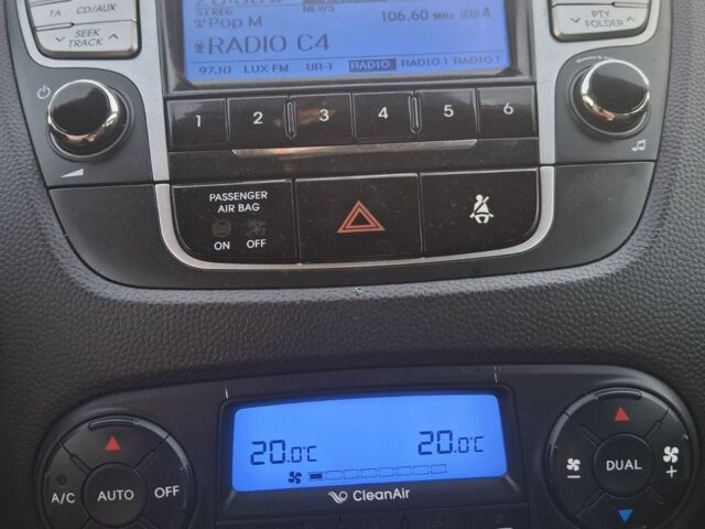 Сірий Хендай іх35, об'ємом двигуна 2 л та пробігом 230 тис. км за 13300 $, фото 7 на Automoto.ua