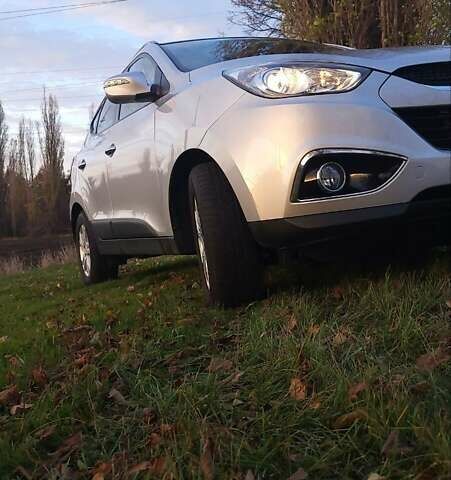 Сірий Хендай іх35, об'ємом двигуна 2 л та пробігом 208 тис. км за 14750 $, фото 22 на Automoto.ua