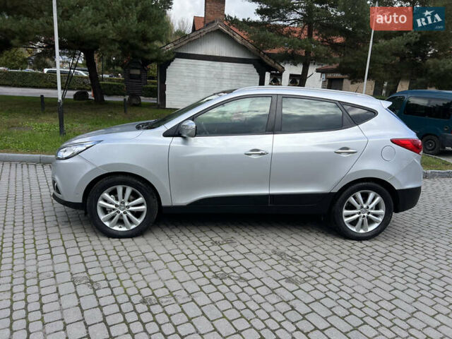 Сірий Хендай іх35, об'ємом двигуна 2 л та пробігом 253 тис. км за 13900 $, фото 4 на Automoto.ua