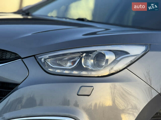 Сірий Хендай іх35, об'ємом двигуна 2 л та пробігом 230 тис. км за 14450 $, фото 5 на Automoto.ua