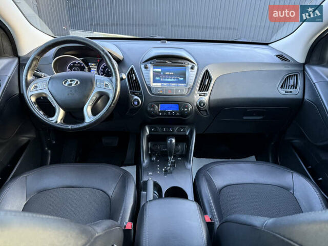 Сірий Хендай іх35, об'ємом двигуна 2 л та пробігом 230 тис. км за 14450 $, фото 25 на Automoto.ua