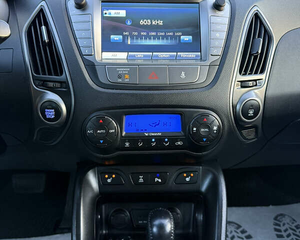 Сірий Хендай іх35, об'ємом двигуна 2 л та пробігом 230 тис. км за 14450 $, фото 32 на Automoto.ua