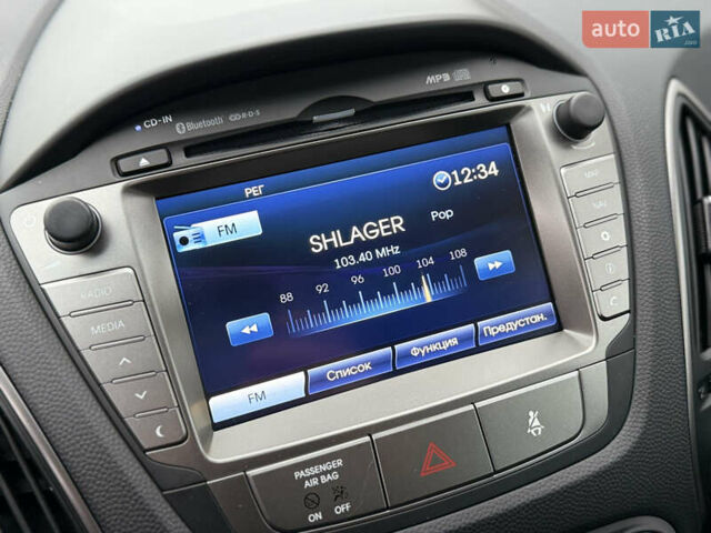 Серый Хендай их35, объемом двигателя 2 л и пробегом 124 тыс. км за 16850 $, фото 53 на Automoto.ua