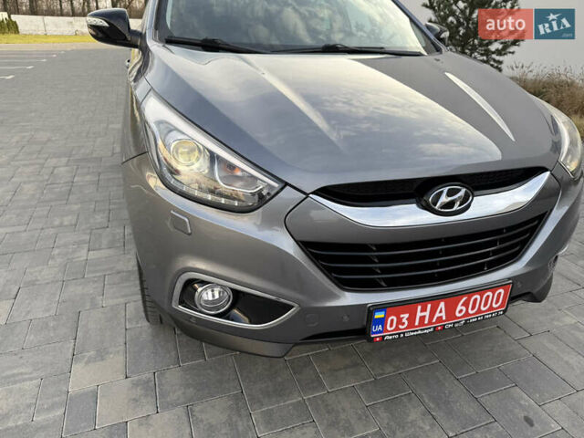 Сірий Хендай іх35, об'ємом двигуна 2 л та пробігом 124 тис. км за 16600 $, фото 9 на Automoto.ua