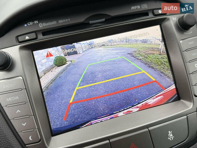 Серый Хендай их35, объемом двигателя 2 л и пробегом 124 тыс. км за 16850 $, фото 54 на Automoto.ua