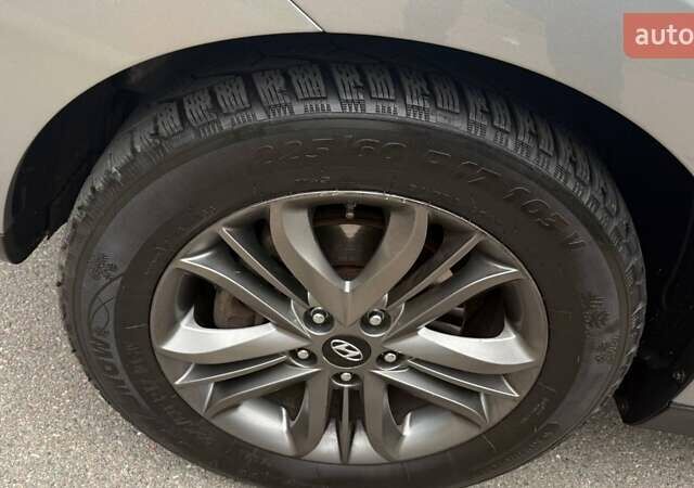 Серый Хендай их35, объемом двигателя 2.4 л и пробегом 127 тыс. км за 11650 $, фото 35 на Automoto.ua