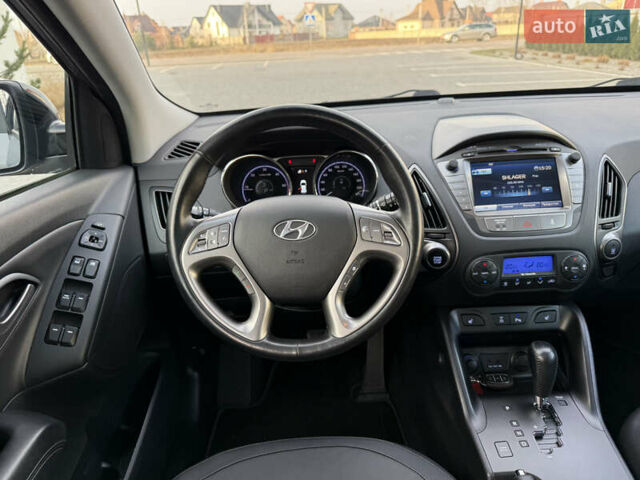Сірий Хендай іх35, об'ємом двигуна 2 л та пробігом 124 тис. км за 16600 $, фото 49 на Automoto.ua