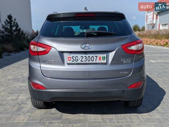 Сірий Хендай іх35, об'ємом двигуна 2 л та пробігом 113 тис. км за 16950 $, фото 5 на Automoto.ua