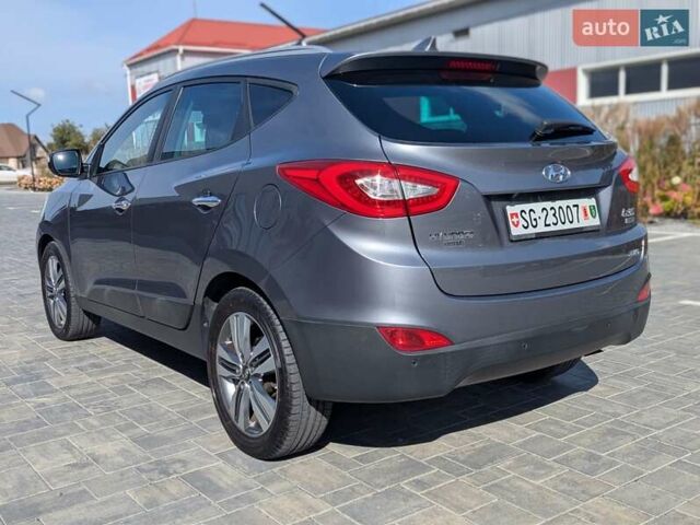 Сірий Хендай іх35, об'ємом двигуна 2 л та пробігом 113 тис. км за 16950 $, фото 14 на Automoto.ua