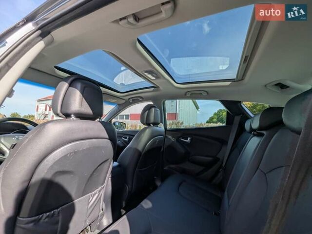Сірий Хендай іх35, об'ємом двигуна 2 л та пробігом 113 тис. км за 16950 $, фото 48 на Automoto.ua