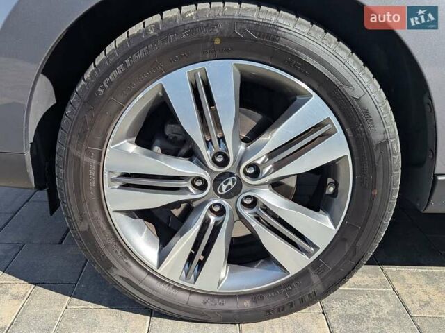 Сірий Хендай іх35, об'ємом двигуна 2 л та пробігом 113 тис. км за 16950 $, фото 32 на Automoto.ua