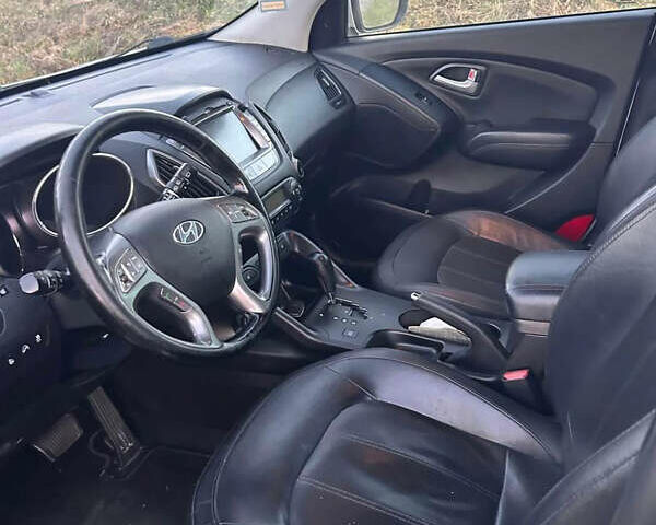Сірий Хендай іх35, об'ємом двигуна 2 л та пробігом 191 тис. км за 15650 $, фото 8 на Automoto.ua