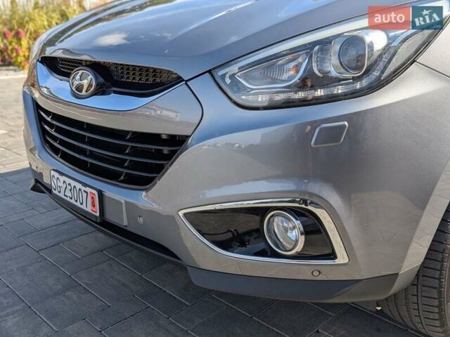 Сірий Хендай іх35, об'ємом двигуна 2 л та пробігом 113 тис. км за 16950 $, фото 28 на Automoto.ua