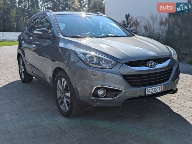 Сірий Хендай іх35, об'ємом двигуна 2 л та пробігом 113 тис. км за 16950 $, фото 11 на Automoto.ua