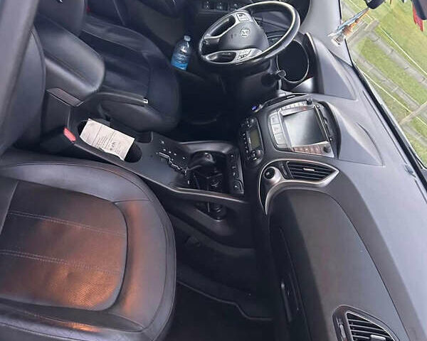 Сірий Хендай іх35, об'ємом двигуна 2 л та пробігом 191 тис. км за 15650 $, фото 6 на Automoto.ua