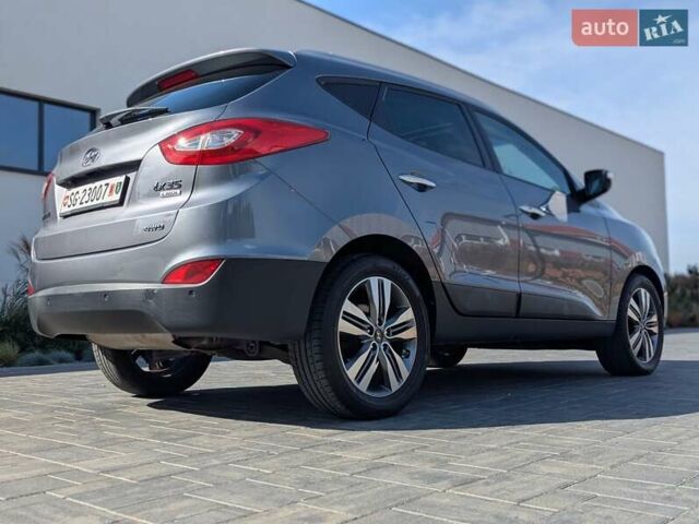 Сірий Хендай іх35, об'ємом двигуна 2 л та пробігом 113 тис. км за 16950 $, фото 22 на Automoto.ua