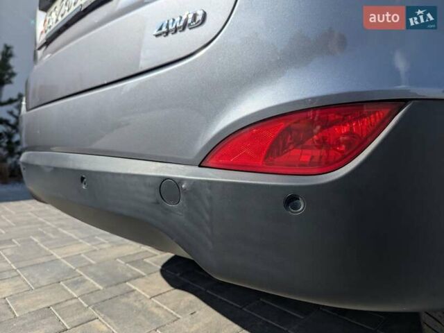 Сірий Хендай іх35, об'ємом двигуна 2 л та пробігом 113 тис. км за 16950 $, фото 26 на Automoto.ua