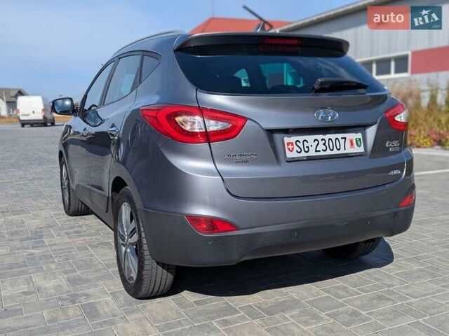 Сірий Хендай іх35, об'ємом двигуна 2 л та пробігом 113 тис. км за 16950 $, фото 9 на Automoto.ua