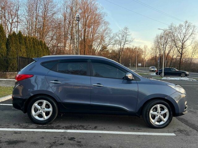 Синий Хендай их35, объемом двигателя 2 л и пробегом 248 тыс. км за 9916 $, фото 12 на Automoto.ua