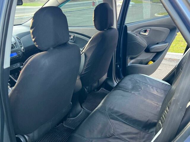 Синий Хендай их35, объемом двигателя 2 л и пробегом 248 тыс. км за 9916 $, фото 4 на Automoto.ua