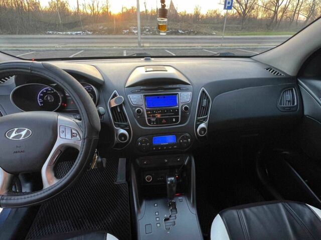 Синий Хендай их35, объемом двигателя 2 л и пробегом 248 тыс. км за 9916 $, фото 6 на Automoto.ua