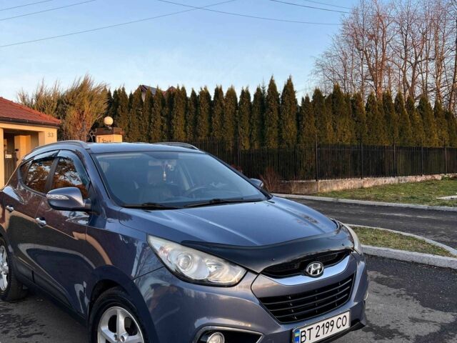 Синий Хендай их35, объемом двигателя 2 л и пробегом 248 тыс. км за 9916 $, фото 11 на Automoto.ua