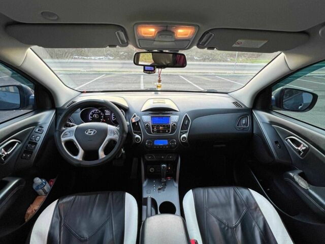 Синий Хендай их35, объемом двигателя 2 л и пробегом 248 тыс. км за 9916 $, фото 2 на Automoto.ua