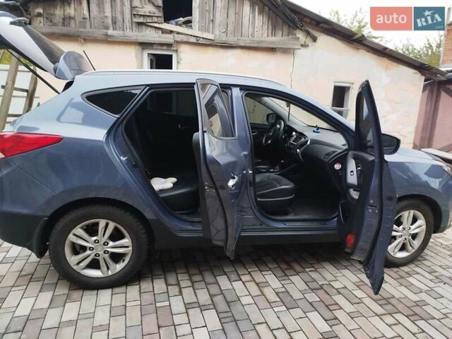 Синий Хендай их35, объемом двигателя 2 л и пробегом 200 тыс. км за 11000 $, фото 4 на Automoto.ua