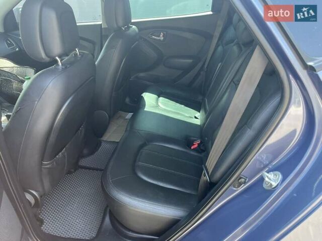 Синий Хендай их35, объемом двигателя 2 л и пробегом 133 тыс. км за 12399 $, фото 4 на Automoto.ua