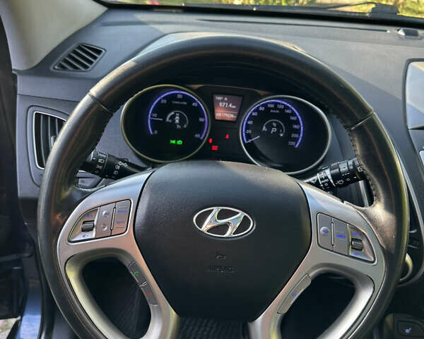 Синій Хендай іх35, об'ємом двигуна 2 л та пробігом 179 тис. км за 12999 $, фото 21 на Automoto.ua