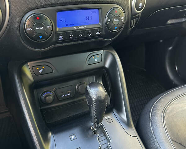 Синій Хендай іх35, об'ємом двигуна 2 л та пробігом 179 тис. км за 12999 $, фото 24 на Automoto.ua