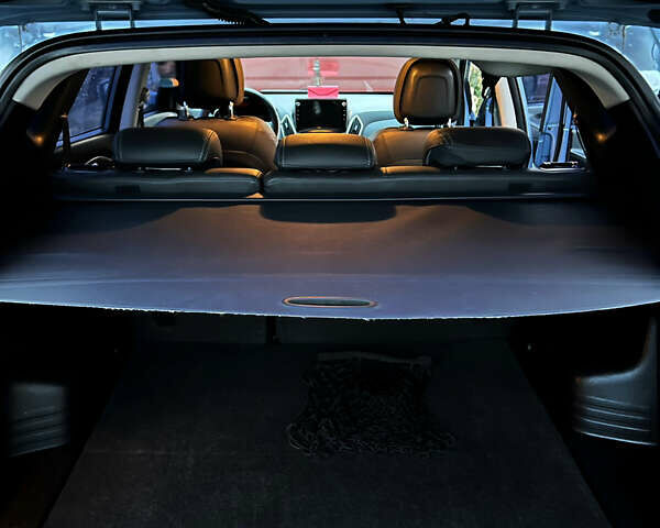 Синий Хендай их35, объемом двигателя 2 л и пробегом 158 тыс. км за 13999 $, фото 14 на Automoto.ua