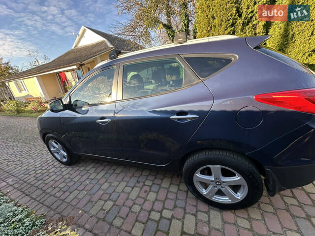 Синій Хендай іх35, об'ємом двигуна 2 л та пробігом 179 тис. км за 12999 $, фото 9 на Automoto.ua