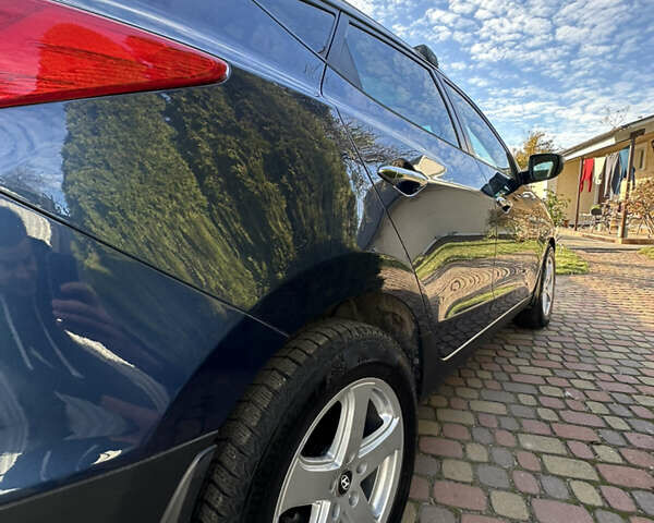 Синій Хендай іх35, об'ємом двигуна 2 л та пробігом 179 тис. км за 12999 $, фото 6 на Automoto.ua