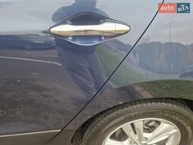 Синий Хендай их35, объемом двигателя 2 л и пробегом 138 тыс. км за 11500 $, фото 17 на Automoto.ua