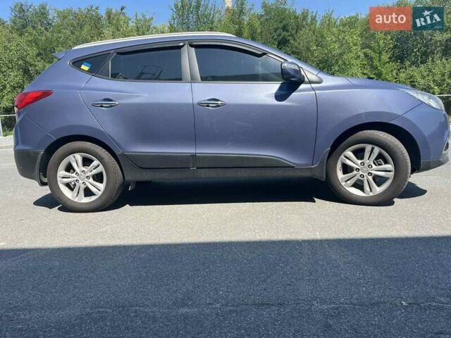 Синий Хендай их35, объемом двигателя 2 л и пробегом 133 тыс. км за 12399 $, фото 9 на Automoto.ua