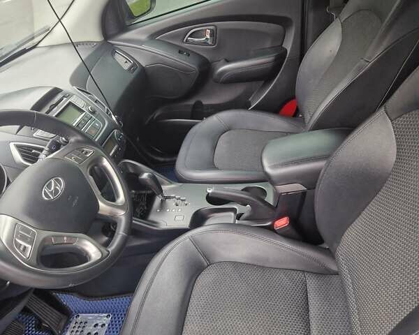 Синий Хендай их35, объемом двигателя 2 л и пробегом 138 тыс. км за 11500 $, фото 20 на Automoto.ua